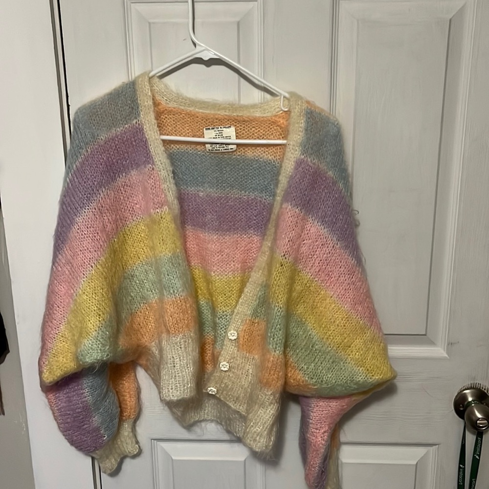 Hand knitted English cardigan. Made of  mohair, wool, and nylon.